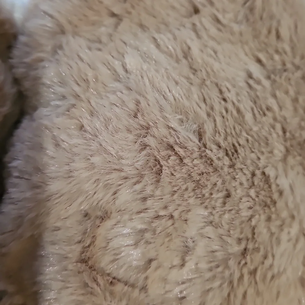 Buckle Almond Milk Plush Blanket